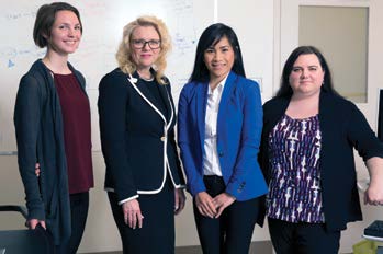 Sharing their learning: (l to r) Lauren Zeleschuk (class of 2018), Chief Medical Information Office Dr. Mary-Lyn Fyfe, Jane Ho (class of 2012), and Julia Pearson (class of 2011) are members of Island Health's growing informatics team.